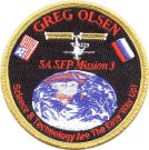 Symbol misji Grega Olsena